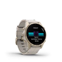 Fenix 8 – AMOLED Sapphire Soft Gold Stainless Steel With A Fog Gray Leather Band plus A Fog Gray/Dark Sandstone Silicone Band 43 mm