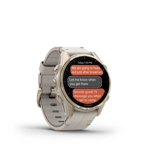 Fenix 8 – AMOLED Sapphire Soft Gold Stainless Steel With A Fog Gray Leather Band plus A Fog Gray/Dark Sandstone Silicone Band 43 mm